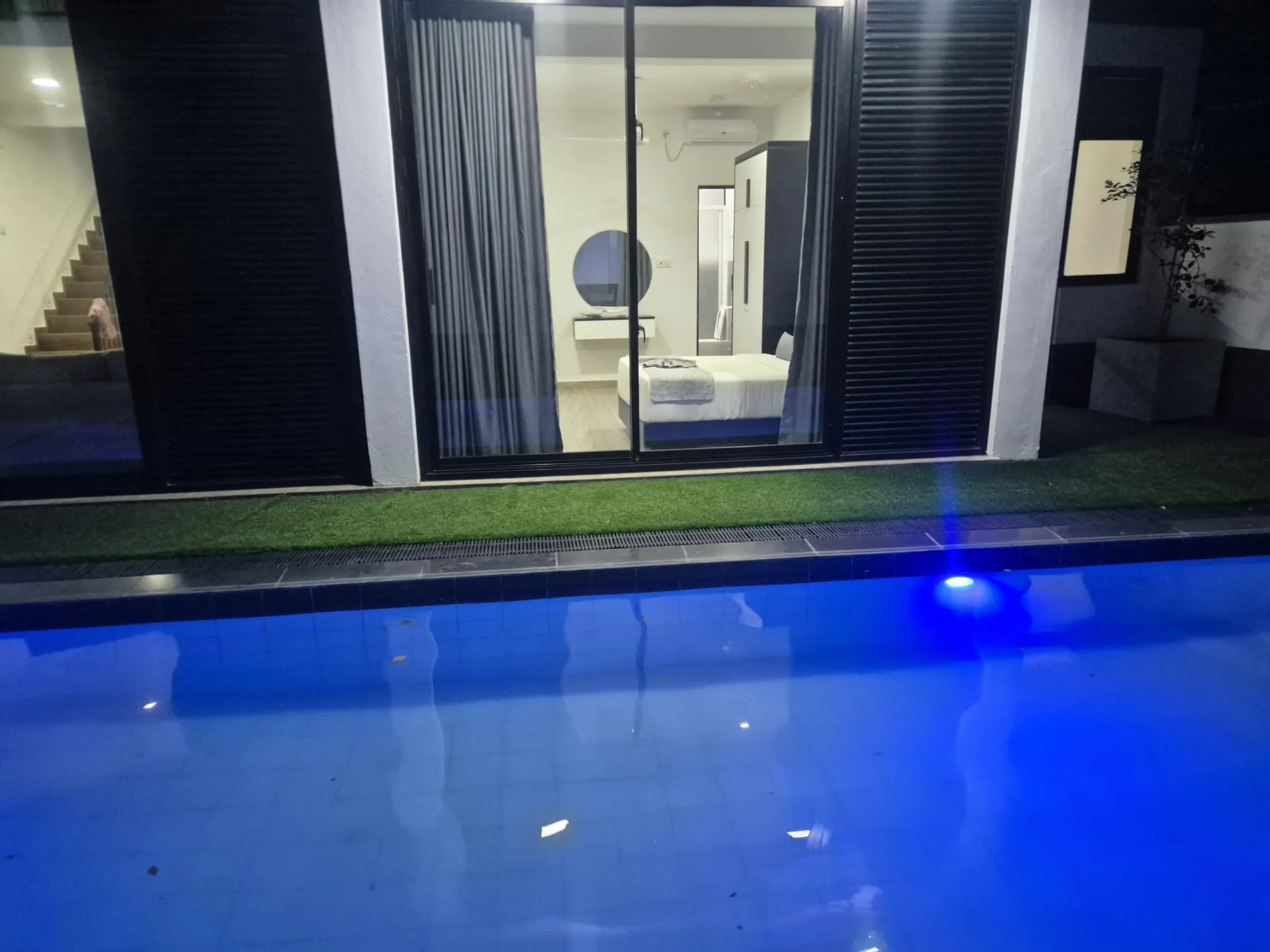 Garden view bedroom suite with private balcony at TenTwo luxury residence Kandy